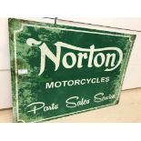 A Norton tin sign