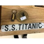 A reproduction Titanic compass,