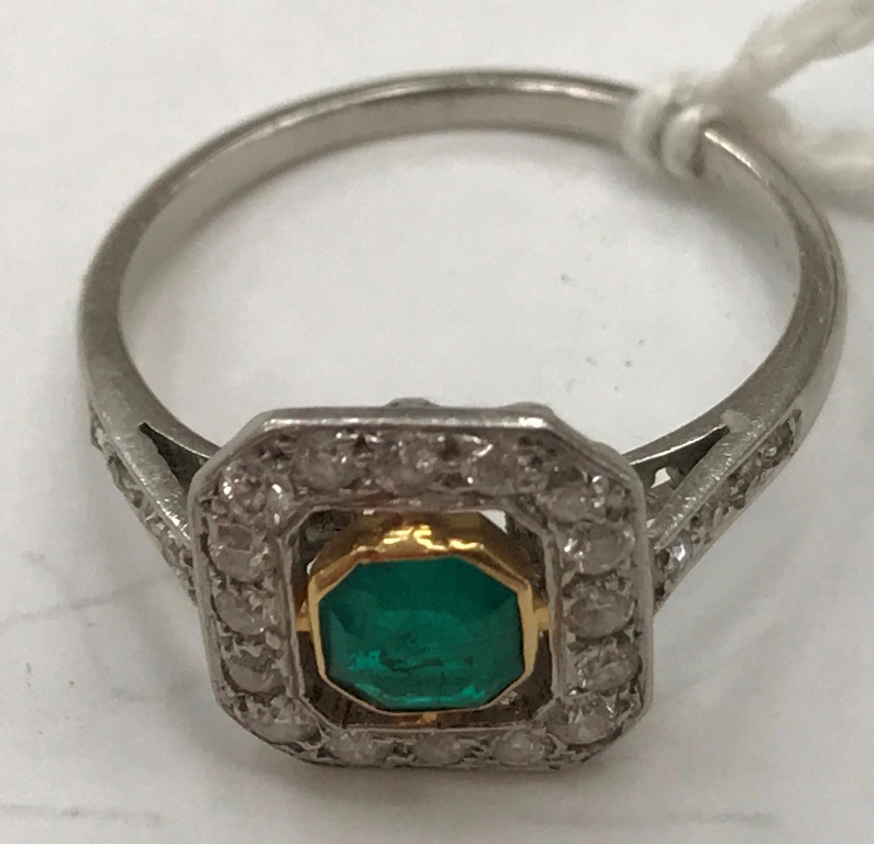 An Art Deco emerald and diamond ring