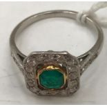 An Art Deco emerald and diamond ring