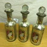 Three stylish perfume bottles