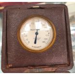 An antique Harrods cased thermometer