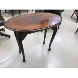 An Edwardian mahogany table