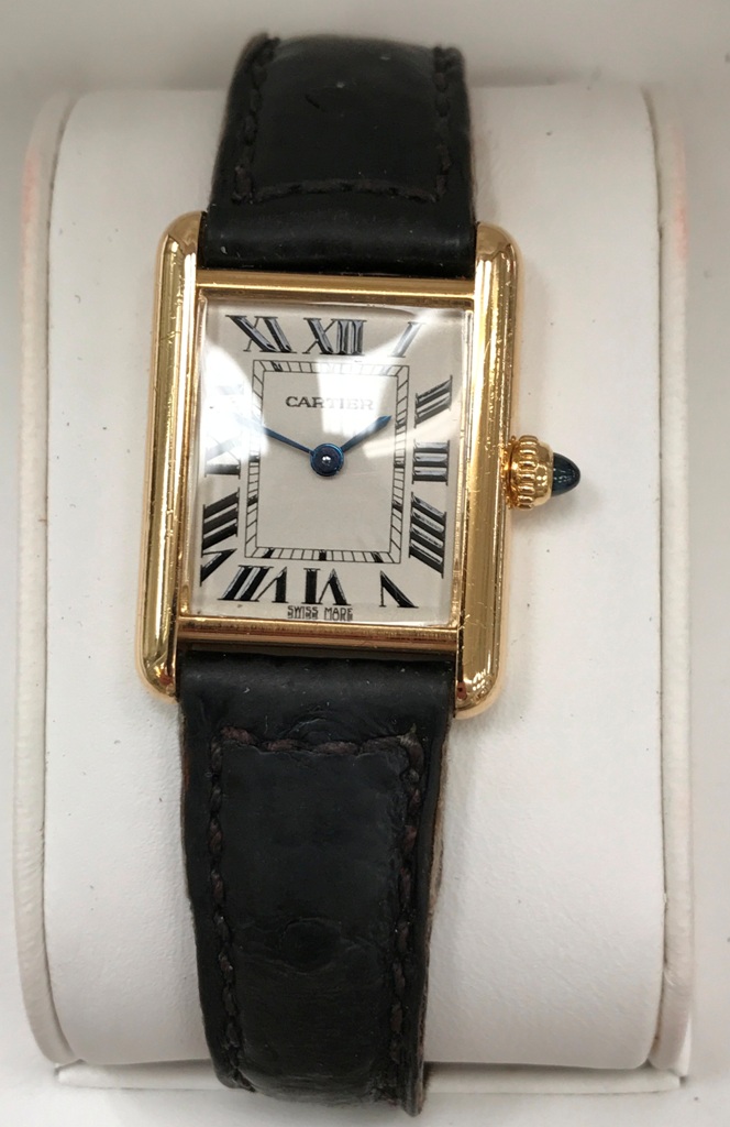 A boxed and cased Cartier 18k Tank ladies watch on leather strap with Cartier 18k buckle: all