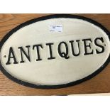 A cast iron antique sign