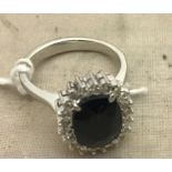 A 14k sapphire and diamond dress ring