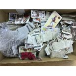 A box of cigarette cards and bubblegum cards