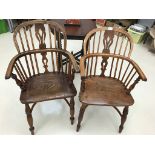 A pair of 19th century elm and ash windsor chairs