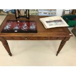 A 19th century mahogany leather-topped desk CONDITION REPORT: Some minor scratches