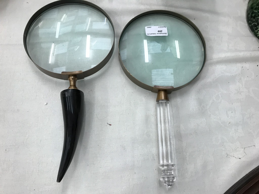 Two large magnifying glasses