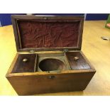 A Victorian mahogany sarcophagus-shaped tea caddy