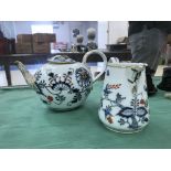 A 19th century Meissen teapot and creamer (A/F)