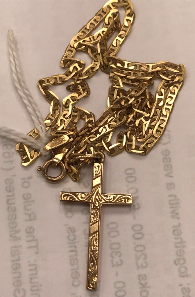 A 9ct crucifix on a 9ct chain