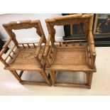 A pair of elm Chinese chairs