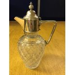 A hallmarked silver topped Mappin & Webb claret jug