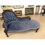 A Victorian mahogany-framed chaise longue