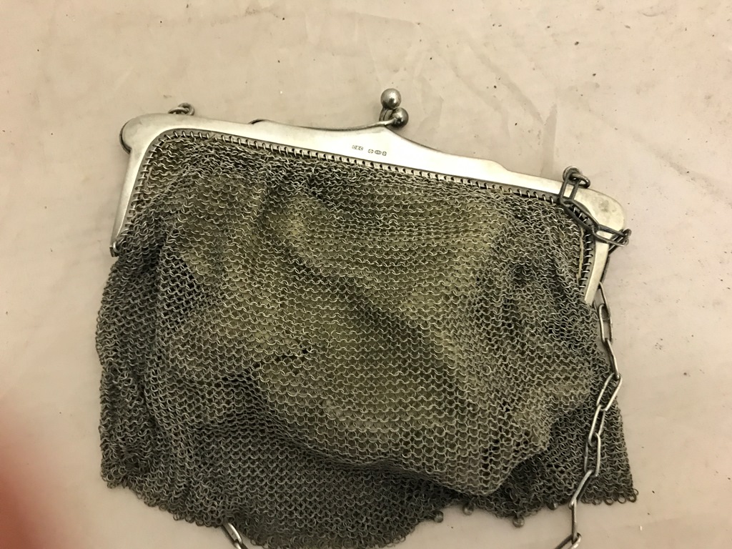 A large HM silver mesh purse/handbag