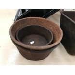 Three cast-iron metal bowls