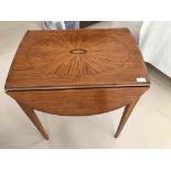 A 19th century satinwood Pembroke table