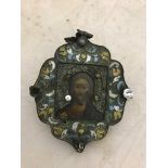 18/19th c enamelled Icon of Christ set with paste jewels,