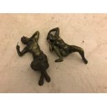 Two nude bronze figures,