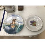 Two painted plates, windmill and fruit,