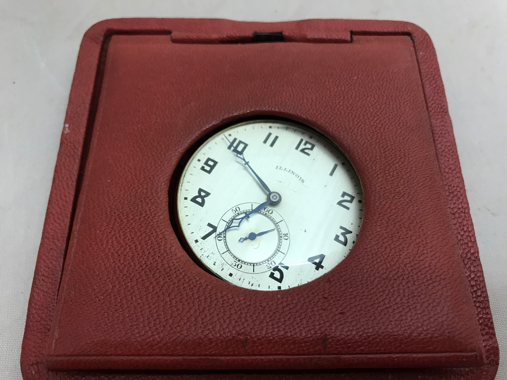 An Illinois 14k gold filled pocket watch "The Autocrat" movement: in red leather travel case