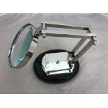 A magnifying glass on stand