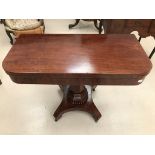 A 19th century mahogany tea table