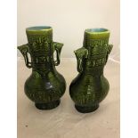 Pair of elephant handled vases