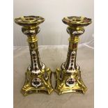 A pair of Royal Crown Derby Imari pattern candlesticks