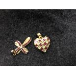 A 9ct gold cross set rubies;