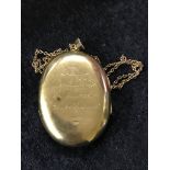 A 9ct gold locket on a 9ct gold chain