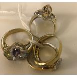 Five 9ct diamond set dress rings