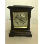 A 19th C mahogany and glass-cased mantel clock