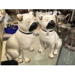 A pair of Staffordshire pug figures