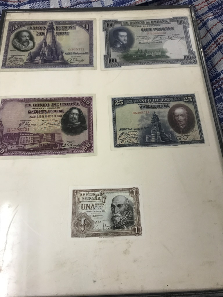 A set of five Spanish notes.