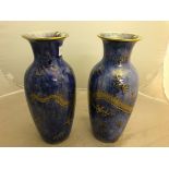 A pair of Wedgwood Lustre dragon vases pattern No Z4829 with printed marks to base: H30 cm