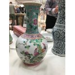 A famille rose vase with bird decoration