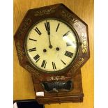 A mahogany and brass inlaid wall clock