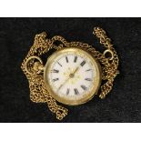 A 14ct gold ladies pocket watch on a 9ct gold chain