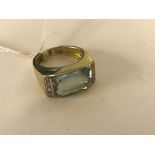 A 14ct gentleman's diamond and blue stone ring