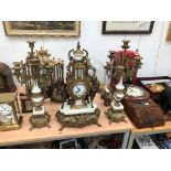 A brass and marble clock garniture,