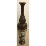 A Doulton Lambeth stoneware vase by Elizah Simmance decorated with foliage in the Art Nouveau style