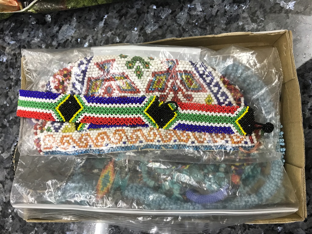 A box of tribal bead jewellery to inc South African and Native American styles;