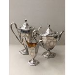 A late Victorian silver-plated coffee pot,