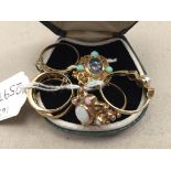 Six gold dress rings set with opal,