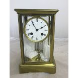 A mercury pendulum glass-cased mantel clock C1900