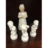 Three Bing & Grondahl blanc de chine figurines of boys;