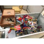 A box of shoulder flashes and divisional patches, whistles,